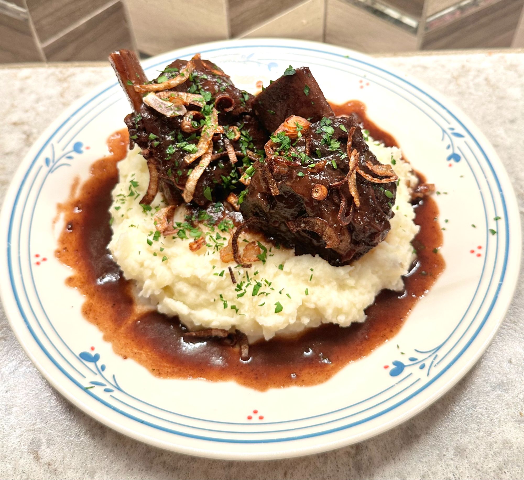 Braised short ribs over mashed potatoes