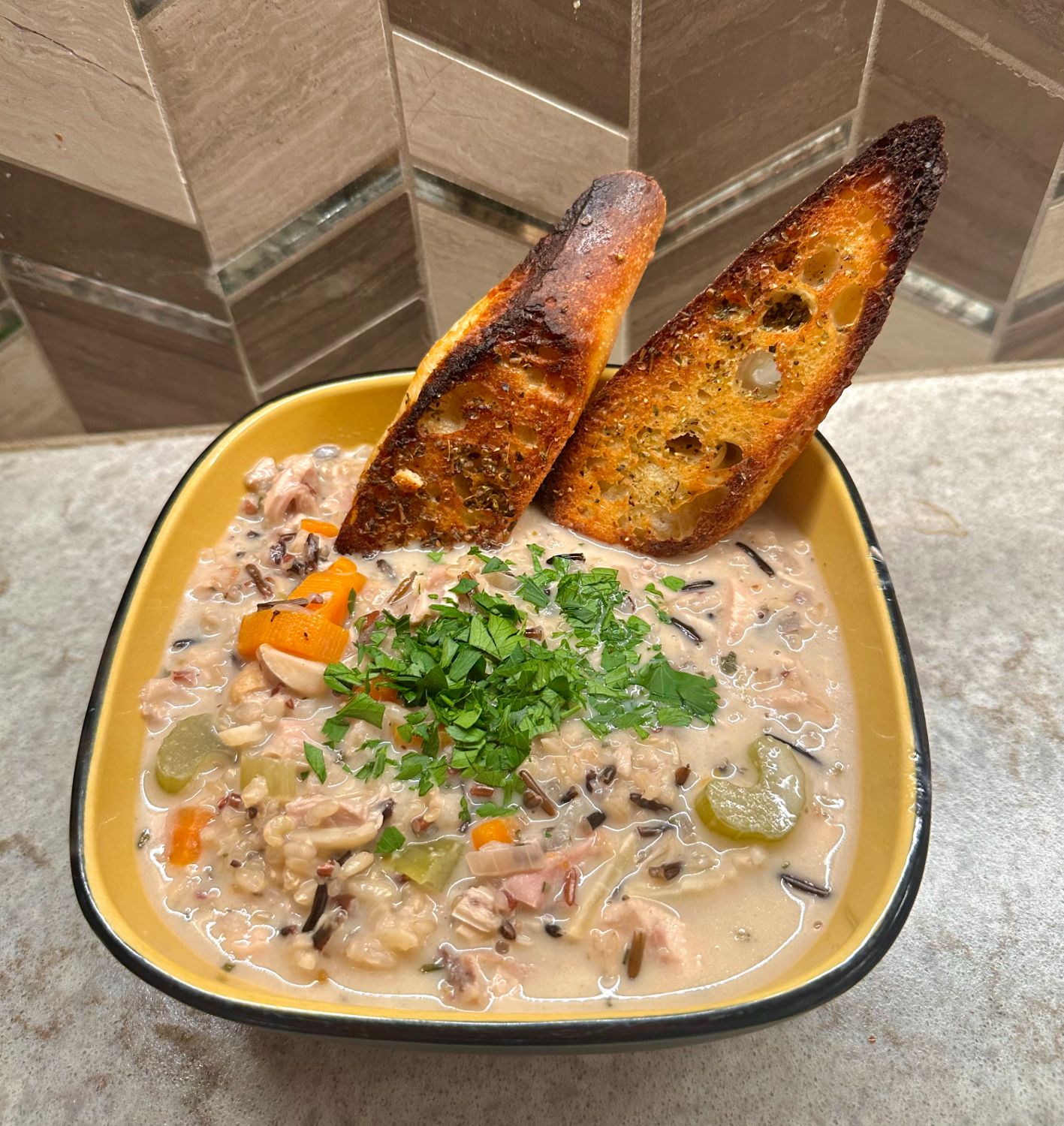 Wild rice chicken soup with crusty bread